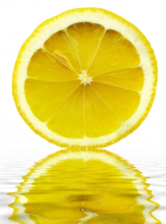 3798442 - close-up lemon slice with reflection in water